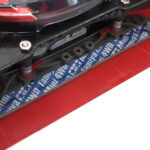 A Tamiya Mini 4WD with a rear brake mount and grey brake sponge