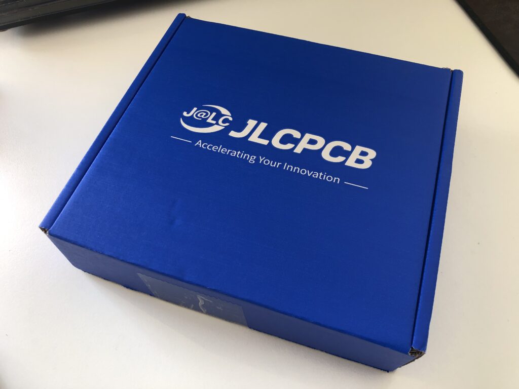 New AI Mini 4WD computer board arrived from JLCPCB in a blue box